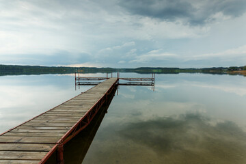 Wooden pier on the lake. Pomerania , Poland