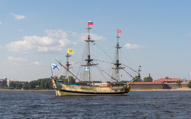 ST. PETERSBURG, RUSSIA - 28 JULY , 2019: Sailing russian frigate Poltava on Neva river on Navy Day Parade. "Poltava" sailing ship is the replica of the first sailing ship of the Russia Baltic Fleet.