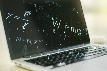 Creative scientific formula hologram on modern laptop background, research concept. Multiexposure