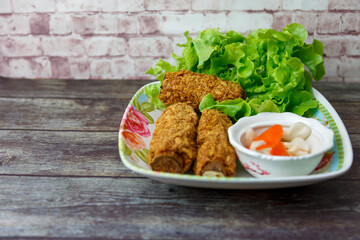 
Shrimp wrapped sugarcane, Vietnamese food In a plate ready to be served