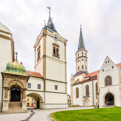 Fototapeta na wymiar View at the Old Town Hall and Basilica of Saint James at the Master Pavol Square in Levoca, Slovakia