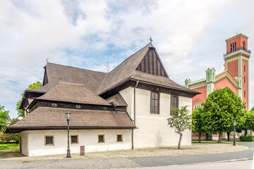 Fototapeta na wymiar View at the Articular Church of Holy Trinity with New Protestant church in Kezmarok - Slovakia