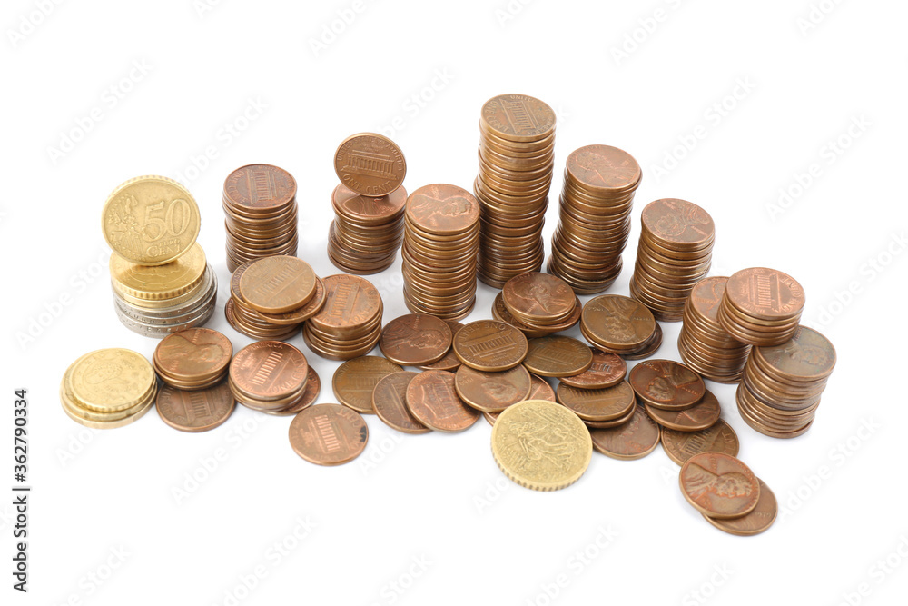 Wall mural many different stacked coins isolated on white