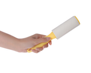 Woman holding lint roller on white background, closeup