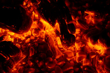 Fototapeta na wymiar Hellfire and embers on a black background