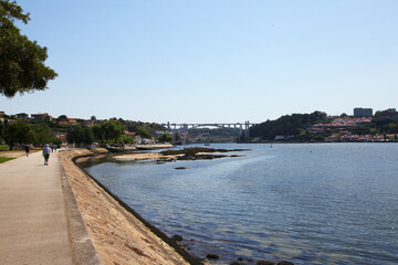 Fototapeta premium Sights and scenes of Porto in Portugal, featuring buildings, river and roads