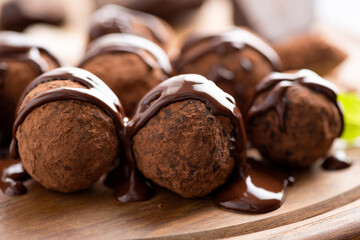 Chocolate truffles with chocolate ganache glaze. Tasty chocolate truffles