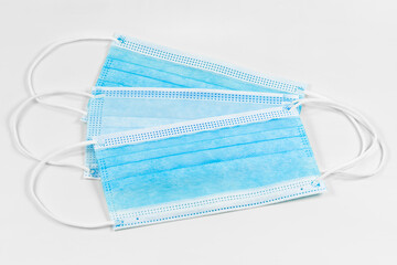 some surgical masks isolated on white background