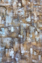 Abstract colorful paint on a wooden surface.