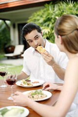 Couple enjoying their meal in the garden