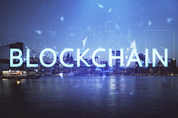 Multi exposure of cryptocurrency theme hologram drawing and city veiw background. Concept of blockchain and bitcoin.