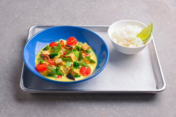 Colorful Asian meat and vegetable dish. Sweet and sour pork and mixed vegetable delicacy. Tasty dinner.