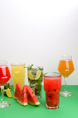 Refreshing cold watermelon juice cocktails. Fruit summer drinks. Five cold melon cocktails. Copy space banner.