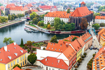 Naklejka premium Wroclaw. Picturesque view of famous, old island Tumski and church of our Lady on Piasek from tower of cathedral of St. Johnion. Poland.