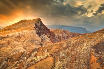 Obraz premium The magnificent dramatic landscape with the red desert dunes on the Ponta de São Lourenço (Saint Lourence cape) on Madeira island