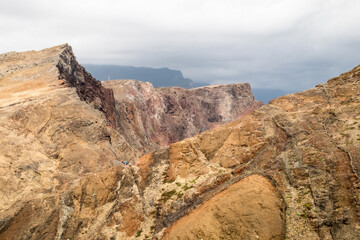 Fototapeta premium The magnificent dramatic landscape with the red desert dunes on the Ponta de São Lourenço (Saint Lourence cape) on Madeira island