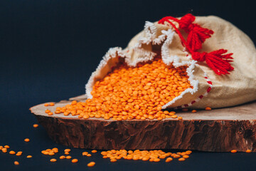 
Natural grains of red lentils in a pouch