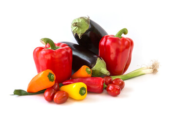 Healthy food, vegetable, paprika, eggplant and tomatos on a white background