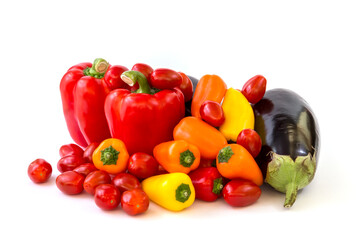 Healthy food, vegetable, paprika, eggplant and tomatos on a white background