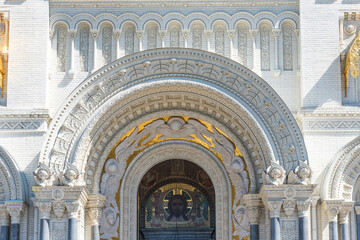 Fototapeta na wymiar Architectural detail of The Naval cathedral of Saint Nicholas in Kronstadt, Russia. Facade detail of Kronstadt Naval Cathedral.