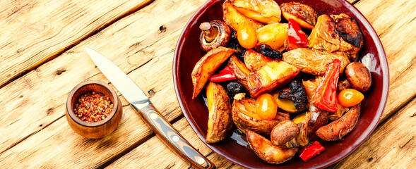 Fried potatoes with mushrooms