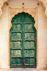 Jodhpur, Rajasthan, India – December 27, 2014 : Details of an old style well decorated door in the Mehrangarh Fort - Jodhpur