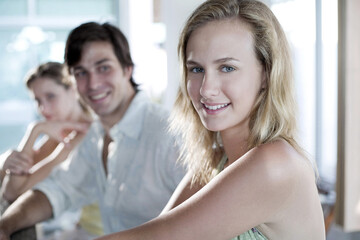 Man and women sitting at the bar counter