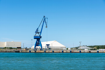 Fototapeta premium Blue crane at Bayonne Port on the Adour River in France