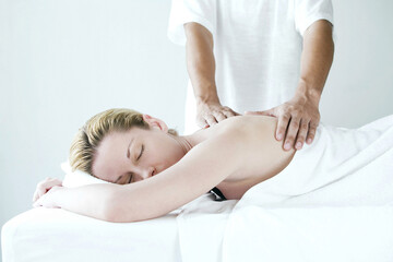 Obraz na płótnie Canvas Woman enjoying a body massage