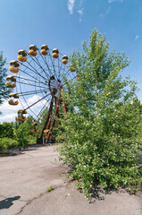 Fun fair, ferris wheel in Prypiat, Chernobyl exclusion Zone. Chernobyl Nuclear Power Plant Zone of...
