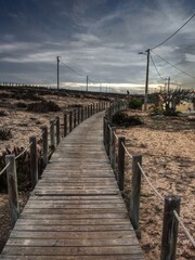 Beach boardwalk. Faro, Algarve Portugal.