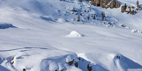 Snowy winter mountains panoramic landscape in the Dolomites Alps in Italy.