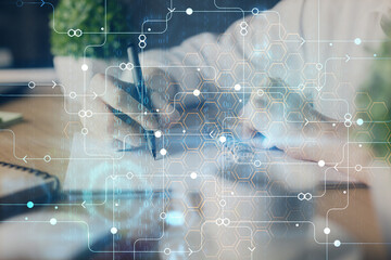 Double exposure of woman's hands on background with technology and digital coding icons. Data development concept. Close up.