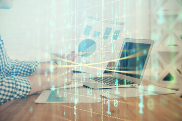 Double exposure of tech drawings with hands working on computer background. Concept of innovation.