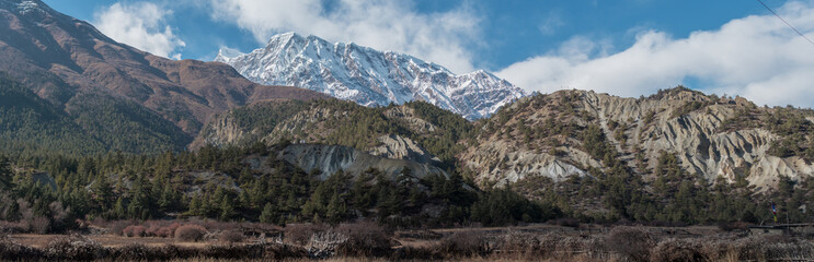 Naklejka na ściany i meble Panorama of mountains trekking Annapurna circuit, Marshyangdi river valley, Nepal