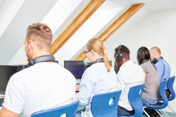 Group of student colleagues in computer training