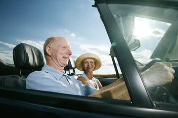 Senior couple travelling together in the car