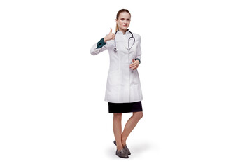 Beautiful female doctor in medical coat showing thumbs up gesture.