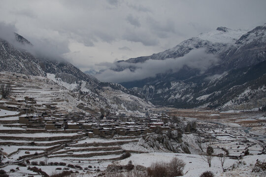 Ledar mountain village in snow by Marshyangdi river, Annapurna circuit, Nepal