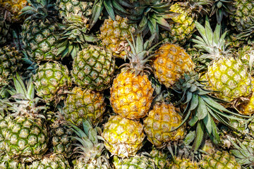 Fresh citrus ripe pineapples pattern background