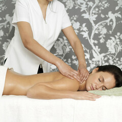 Fototapeta na wymiar Woman enjoying a relaxing body massage