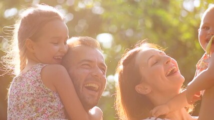 Happy Young big Family with children enjoying nature together, outdoors. Parents with kids. Slow motion. 4K UHD - Powered by Adobe