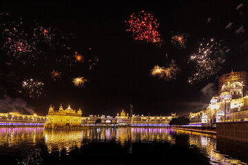 Golden Temple Amritsar lit by Diya and fire crackers Guru Purab festival and Diwali 