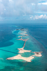 Aerial view of the Maldivian atolls the islands in the ocean with carols and the turquoise beautiful water - 362839917