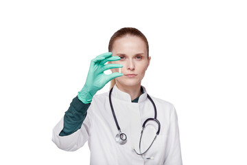 Fototapeta premium Close-up of a doctor hand in surgical gloves. Holds a medicine in his hand