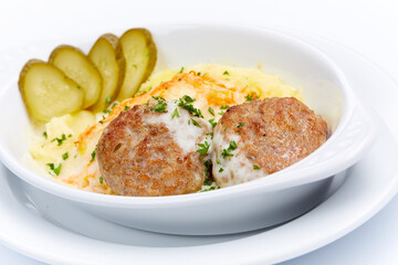 cutlet with mashed potato on white