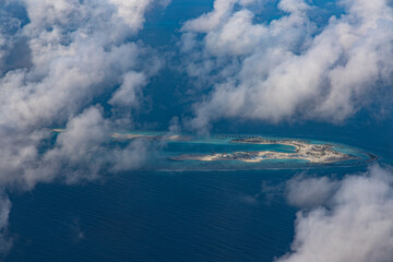 Aerial view of the Maldivian atolls the islands in the ocean with carols and the turquoise beautiful water - 362840560