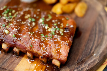 Grilled and smoked ribs with barbeque sauce