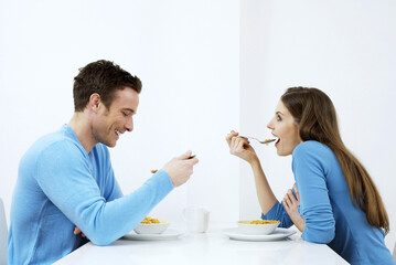 Obraz na płótnie Canvas Couple having breakfast together