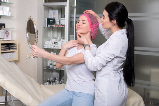 Cosmetologist doctor prepare a woman in her clinic for procedure. Doctor and pacient talking about injections